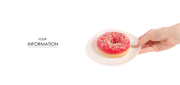 istock Donuts sweetness frosting on plate in hand pattern 943434350