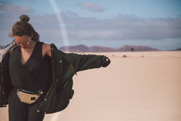 istock Young woman in desert 943444248