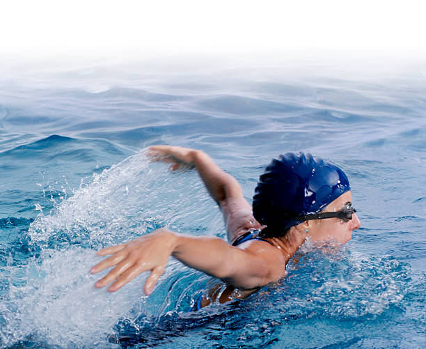 istock Female athlete swimming butterfly at competition 94345054