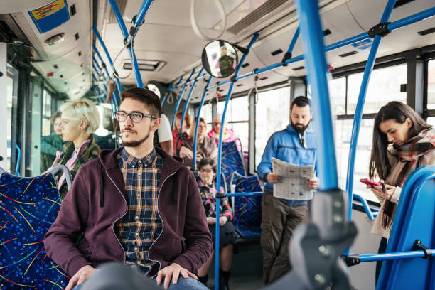 istock People in big city using public bus 943452182