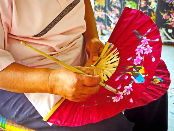 istock Fabric Hand Fan Painting 943452524