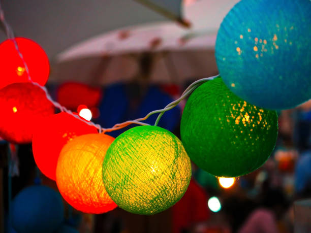 istock Colorful Light Cotton Balls 943452566