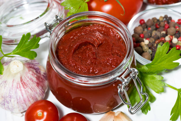 istock fresh tomato sauce and ingredients, top view closeup 943460158