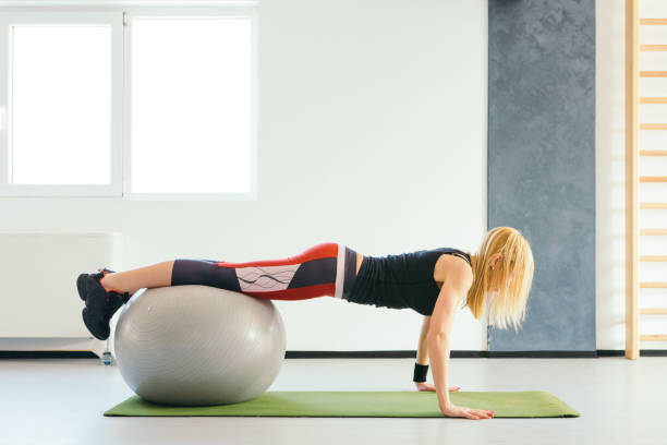 istock Fit Woman Doing Plank on a Pilates Ball 943465198