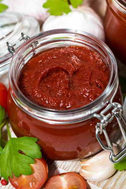 istock tomato sauces, pasta and fresh ingredients on  wooden background 943469152