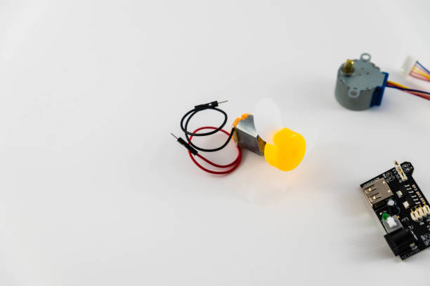 istock Microcontrollers, chips, resistors and light-emitting diodes on white desktop of hardware engineer. Engineer workplace 943483820