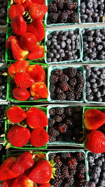istock Berries: Strawberry, Blueberry and blackberry on retail display 943489116