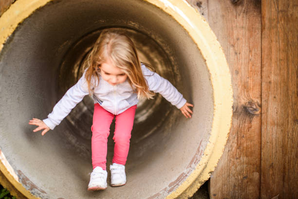 istock Girl playing in the park 943489566