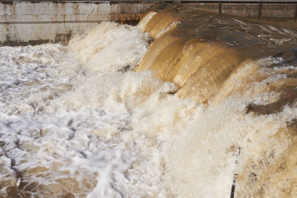 istock Raging muddy water in the river 943498506