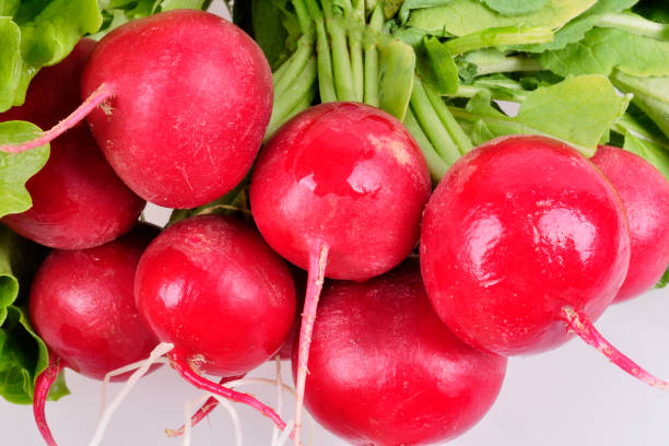 istock Bunch fresh juicy radish close-up on a white background 943499042