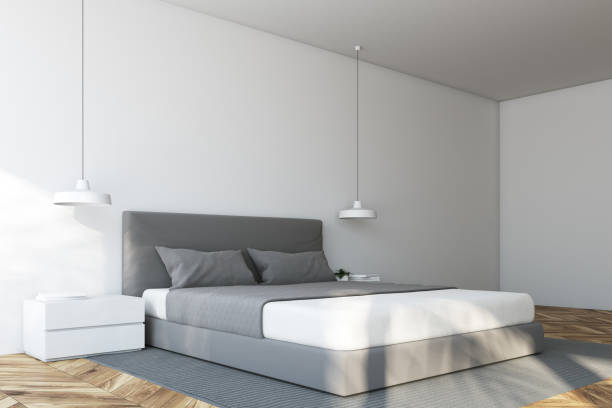 istock White Scandinavian bedroom corner 943506760