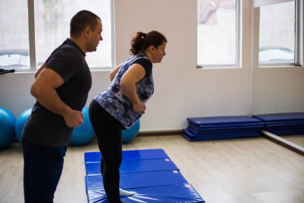 istock Pregnant woman exercising 943528854