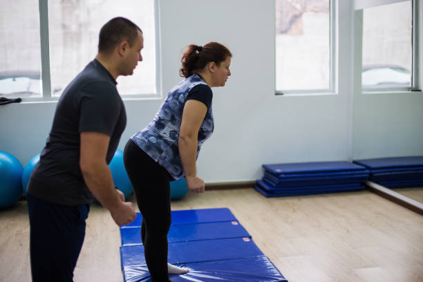 istock Pregnant woman exercising 943529280