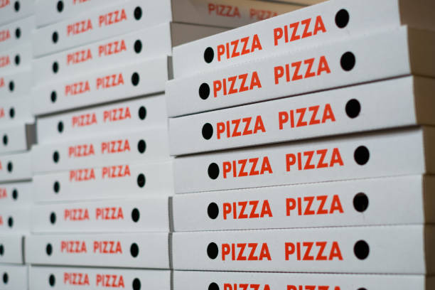 istock stack of pizza boxes , many pizza cartons 943545360