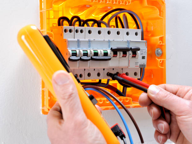 istock Electrician technician at work on a residential electric panel 943551480