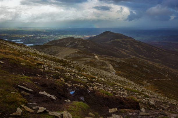 вид с полпути вверх croagh патрик, графство майо, ирландия - croagh patrick стоковые фото и изображения