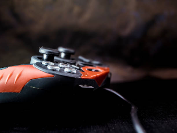 istock red and black game joystick close up shot 943564170