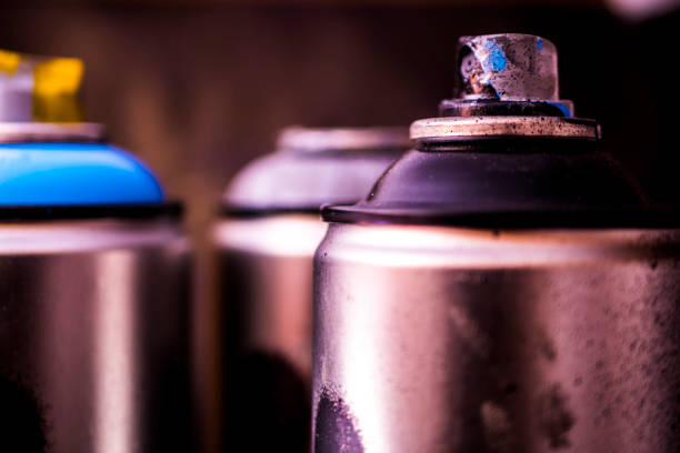 istock close up graffiti aerosol spray paint cans black background 943564198