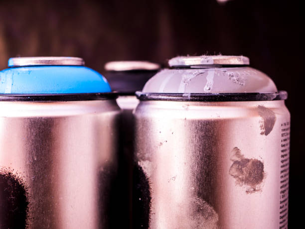 istock close up used spray paint cans for graffiti black background 943564212