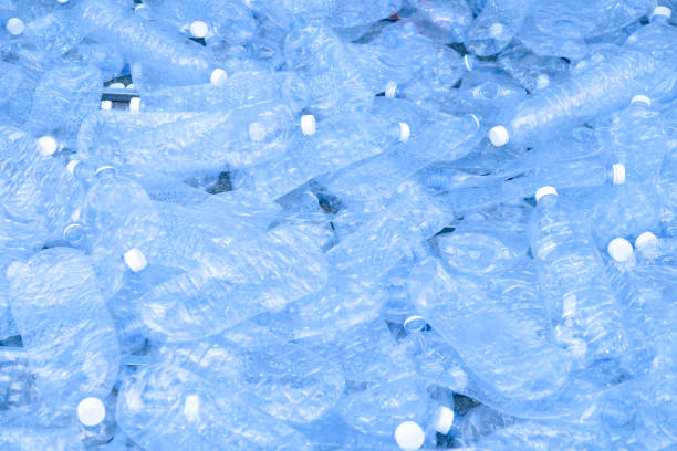 istock Composition with plastic bottles of mineral water. Plastic waste 943578940