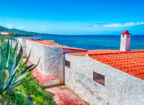 istock View of sardinian beach from a typical building 943582116