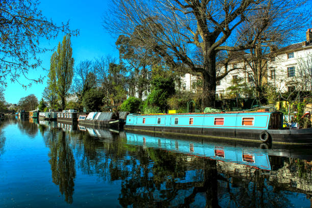 The river with a bots, trees and a blue sky - Best Landscape Collection Little Venice - London little venice london stock pictures, royalty-free photos & images