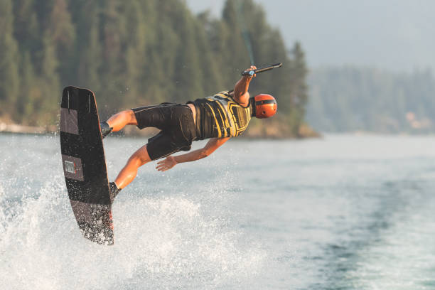 istock Male wakeboarder on lake 943594952