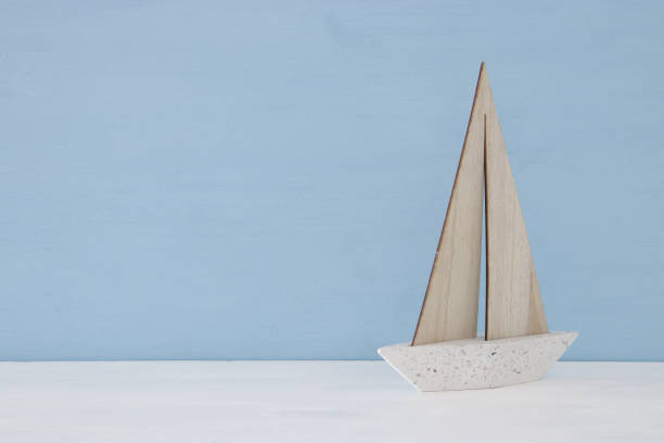istock nautical concept with sail boat over blue background. 943597926