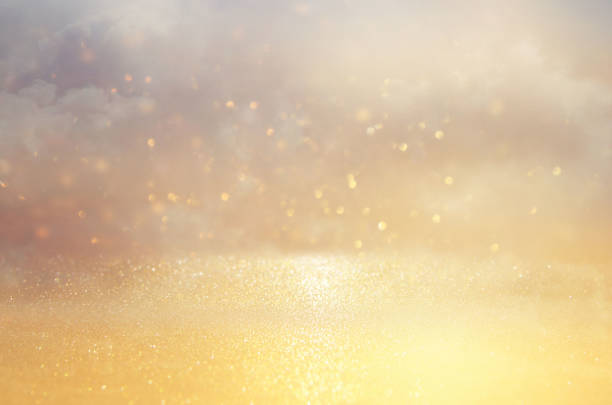 istock glitter vintage lights background. gold and silver. de focused. 943597956