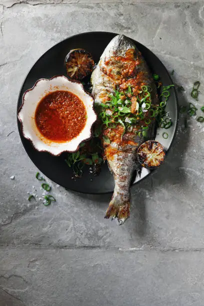 Barbecued whole snapper with sauce