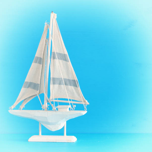 istock nautical concept with sail boat over blue background. 943608672