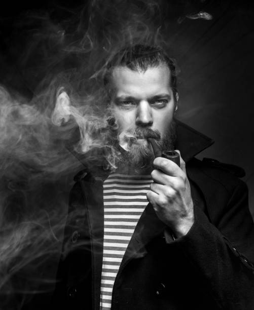 istock Sailor Man With Beard Smoking Pipe, Black And White Photo. Creativity Professional Portrait 943620952