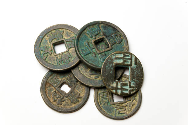 istock Ancient Chinese bronze coins on white background 943627008