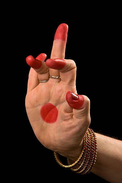 Schukatunda hasta of indian dance Bharata Natyam Woman hand showing Schukatunda hasta (hand gesture, also called mudra) (meaning "Parrot's head") of indian classic dance Bharata Natyam. Also used in Indian dances Odissi and Kuchipudi. bharatanatyam dancing stock pictures, royalty-free photos & images