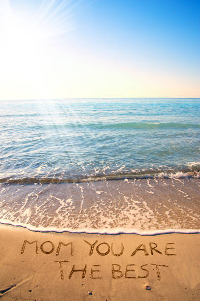 istock Mother's Day celebration on the beach 943642974