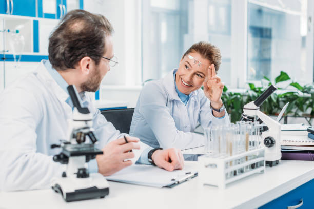 istock scientific researchers in white coats working together at workplace in laboratory 943645848
