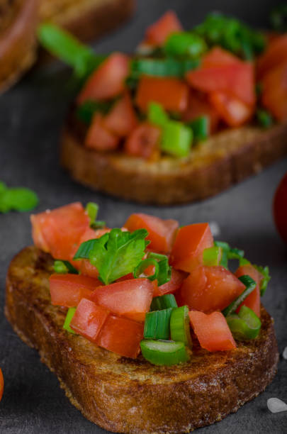 istock French garlic toast with vegetable salad 943648392