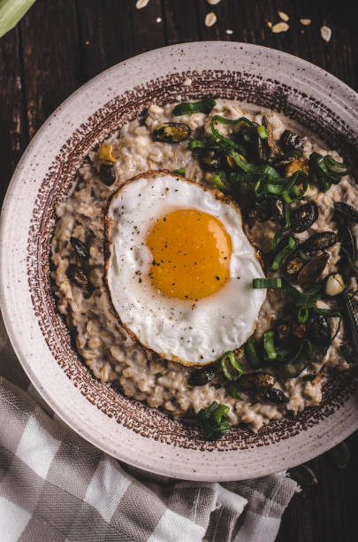 istock oatmeal salty with spring onion and egg 943655556