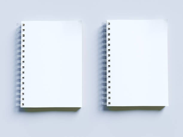 istock Empty photorealistic mock-up notebook on a light gray background, 3d illustration. 943655858