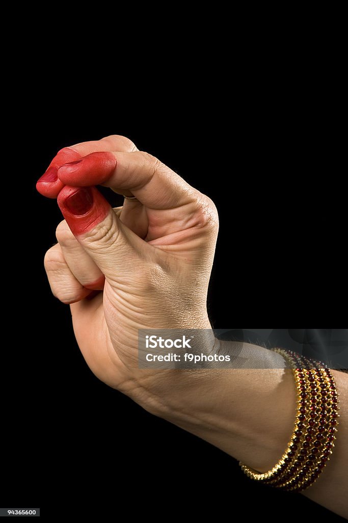 Katakamukha hasta of indian dance Bharata Natyam Woman hand showing Katakamukha hasta (hand gesture, also called mudra)  (meaning opening in a bracelet) of indian classic dance Bharata Natyam. Also used in Indian dances Odissi and Kuchipudi. Adult Stock Photo