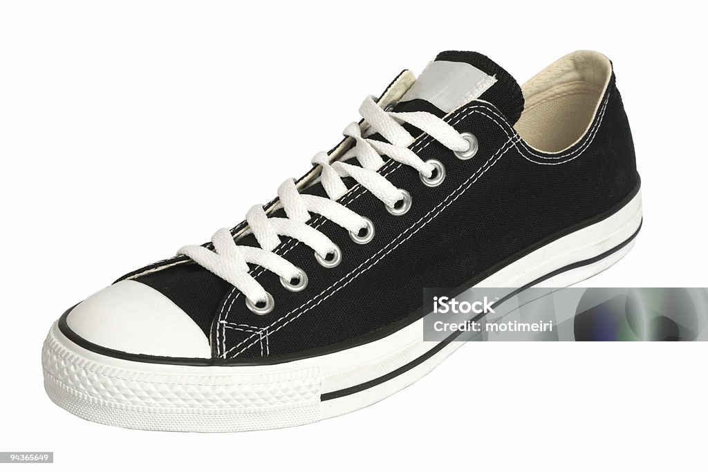 Black canvas sneaker, isolated, clipping path Black canvas sneakers, isolated, clipping path Black Color Stock Photo