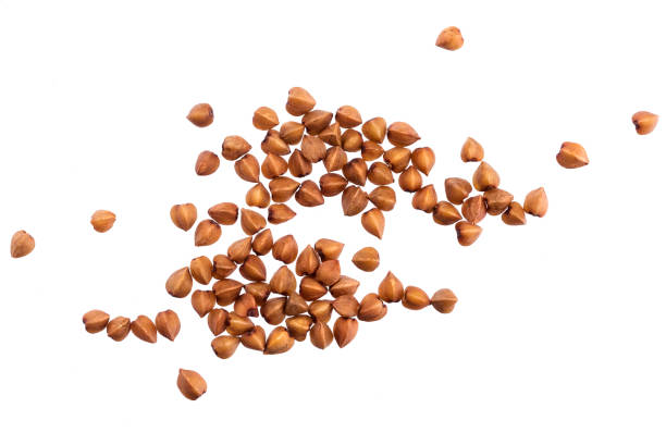 istock Buckwheat grain isolated on white background. Top view 943673918