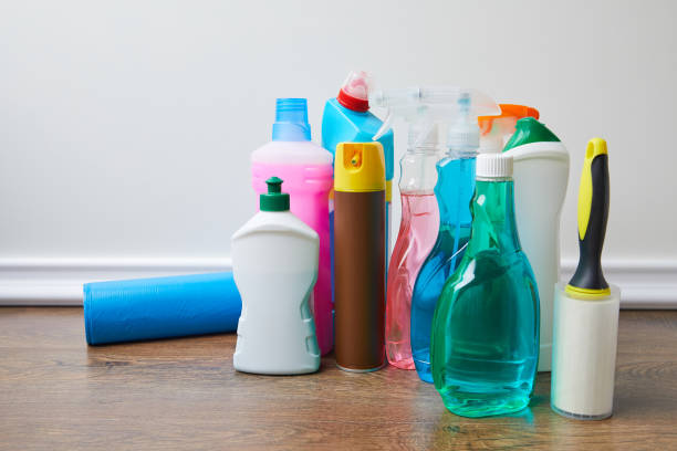 istock bottles with cleaners and spray bottles on floor 943674098