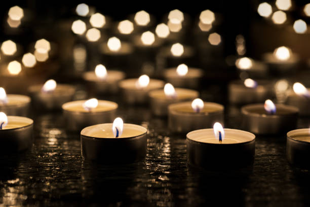 istock Burring candles on decorative glass. 943675458
