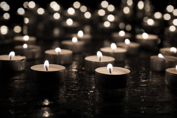 istock Burring candles on decorative glass. 943675610