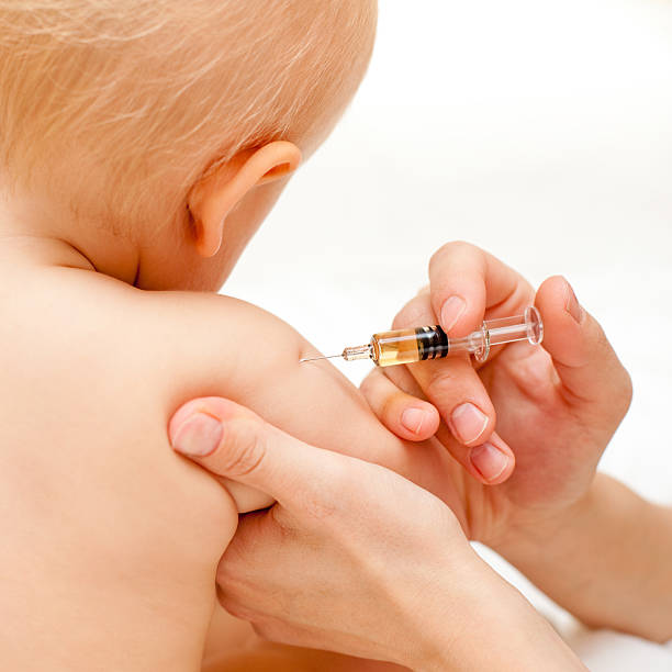 istock Little baby get an injection 94367827