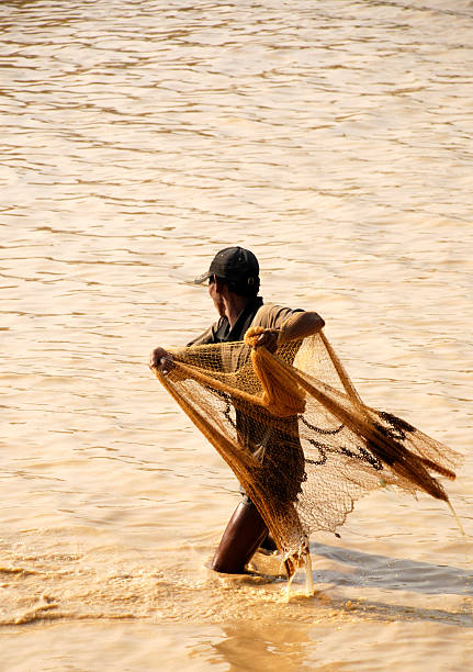 istock Fisherman in Cambodia 94368138