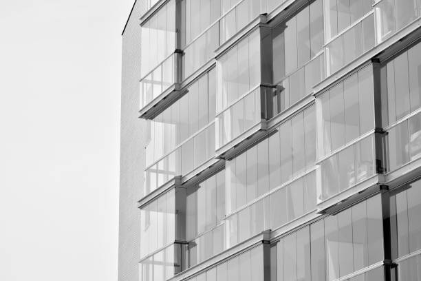 istock Facade of a modern apartment building. Black and white. 943688408