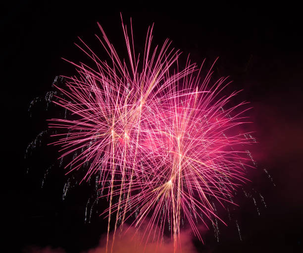istock Abstract colored firework background used for overlay new year festival. 943700570
