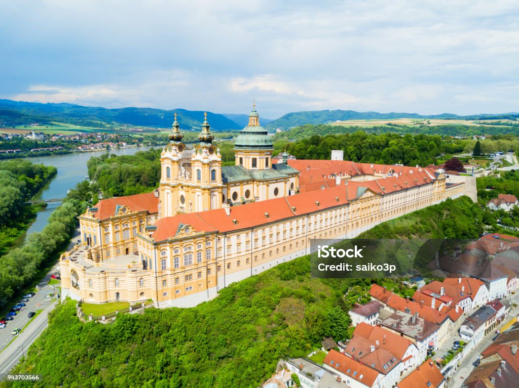 Melk Monastery aerial view Melk Abbey Monastery aerial panoramic view. Stift Melk is a Benedictine abbey in Melk, Austria. Monastery located on a rocky outcrop overlooking the Danube river and Wachau valley. Abbey - Monastery Stock Photo